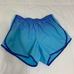Girls light blue Nike running shorts (L)